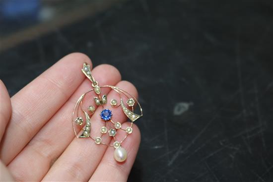 An Edwardian 9ct gold, sapphire and seed pearl set drop pendant, 36mm.